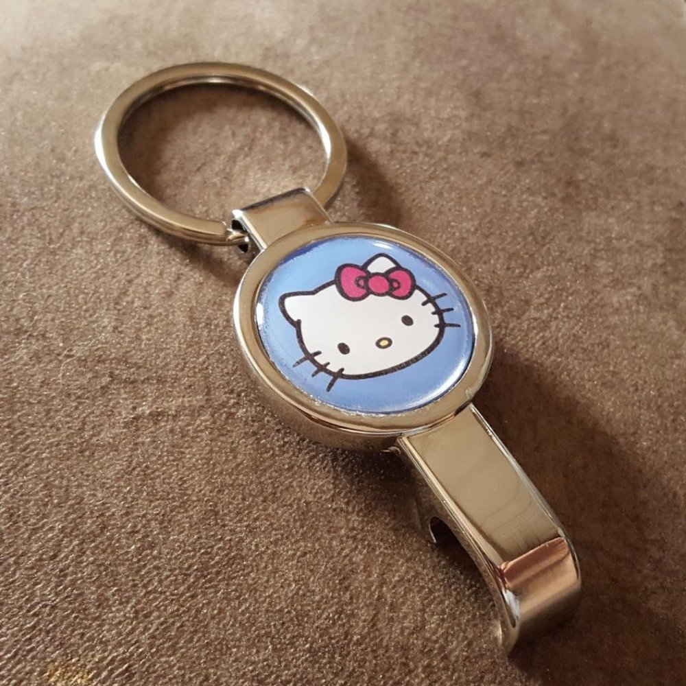 Hello Kitty Pendant or Keychain secret silver metal bottle opener